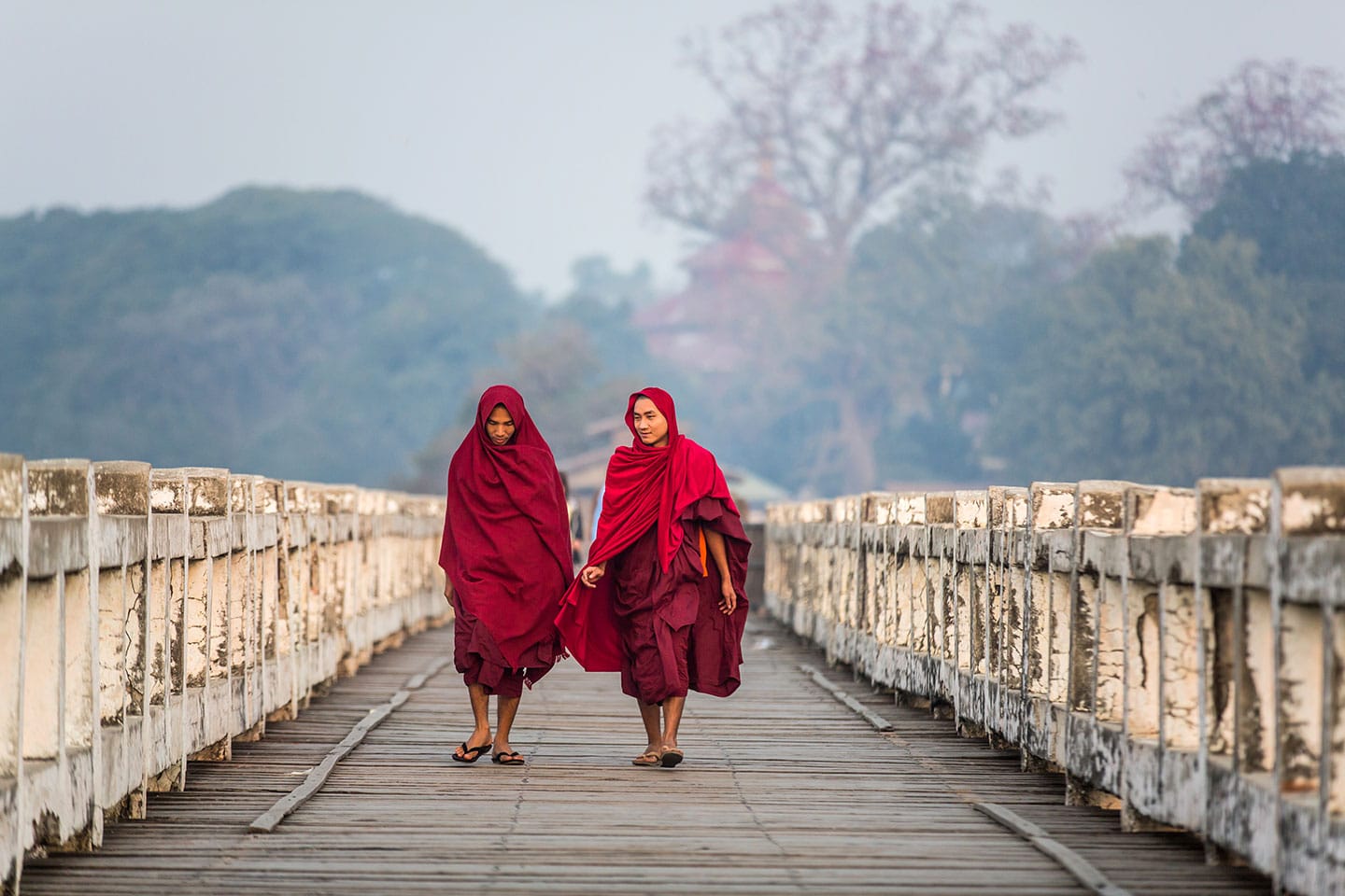 Young monks on the U Bein Bridge in Mandalay, Myanmar