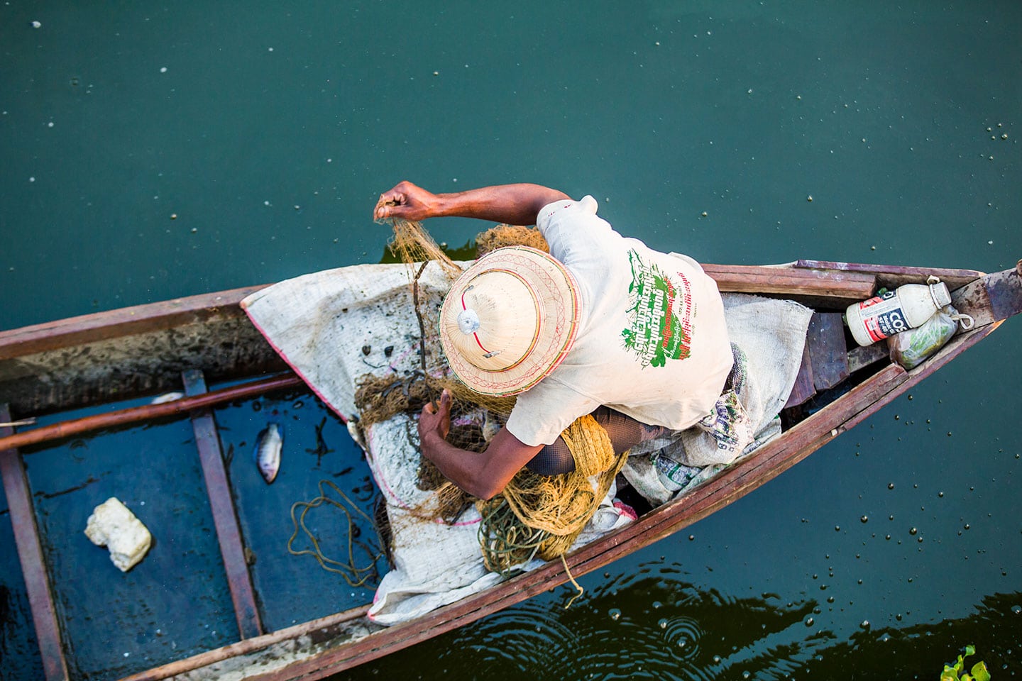 Local woman on a boat in Mandalay, Myanmar