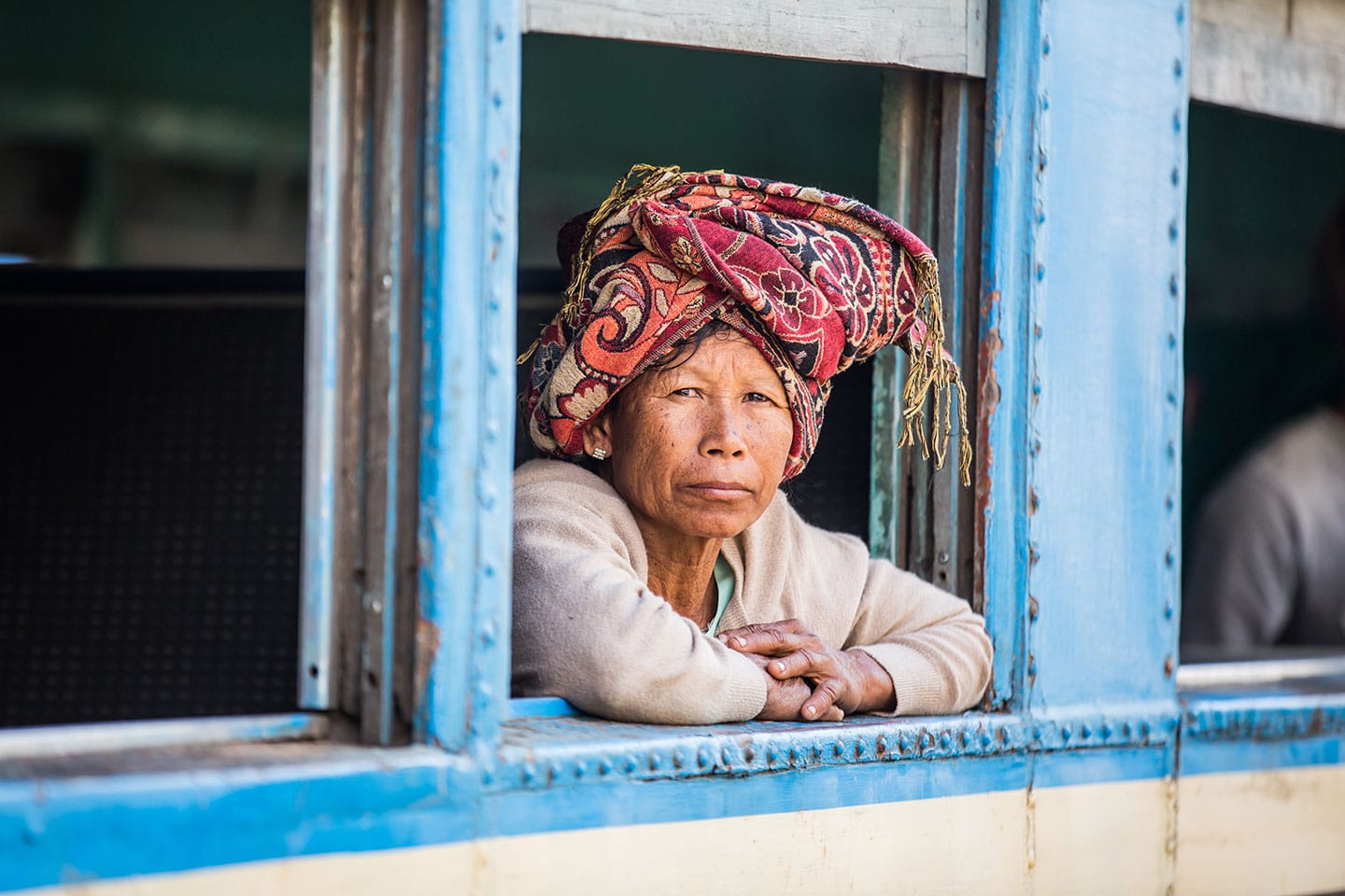 Woman on a local train in Myanmar