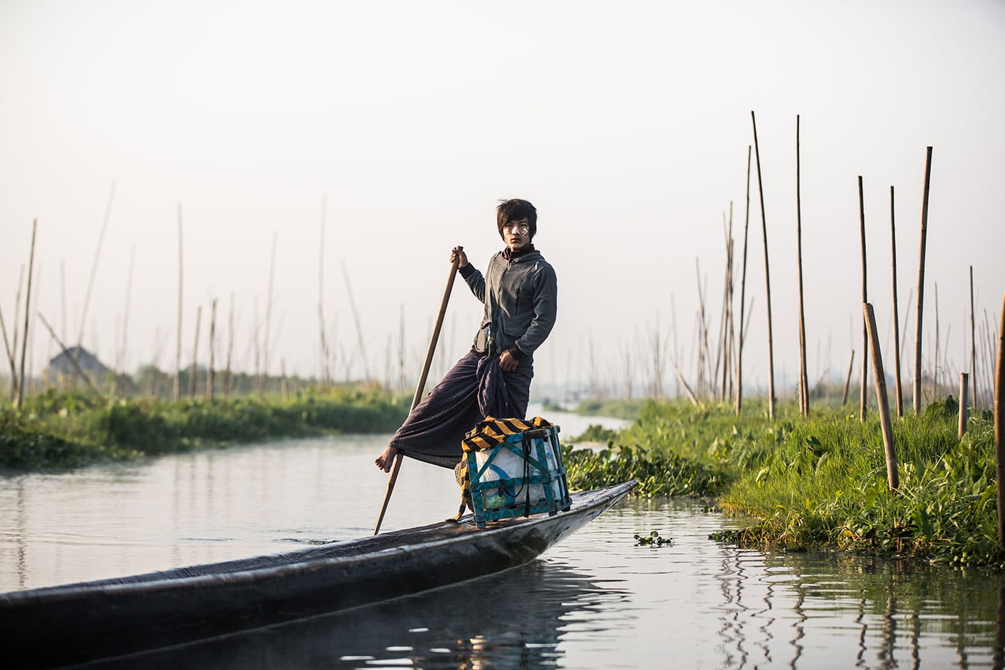 Young boy on the canals around Inle Lake, Myanmar