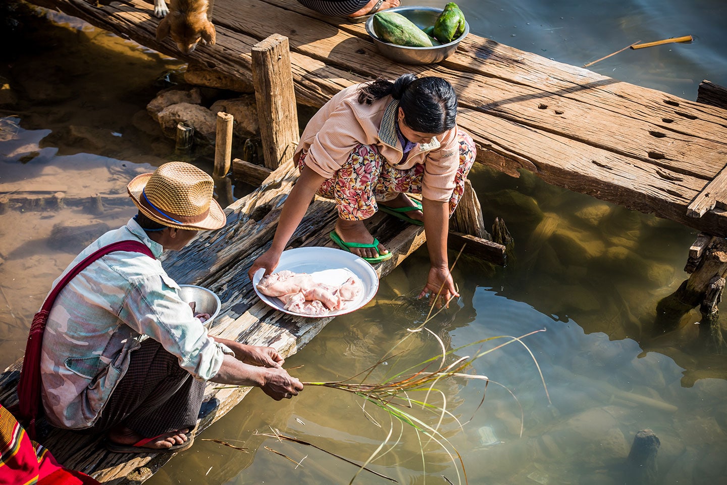 Local people washing clothes at Inle Lake, Myanmar