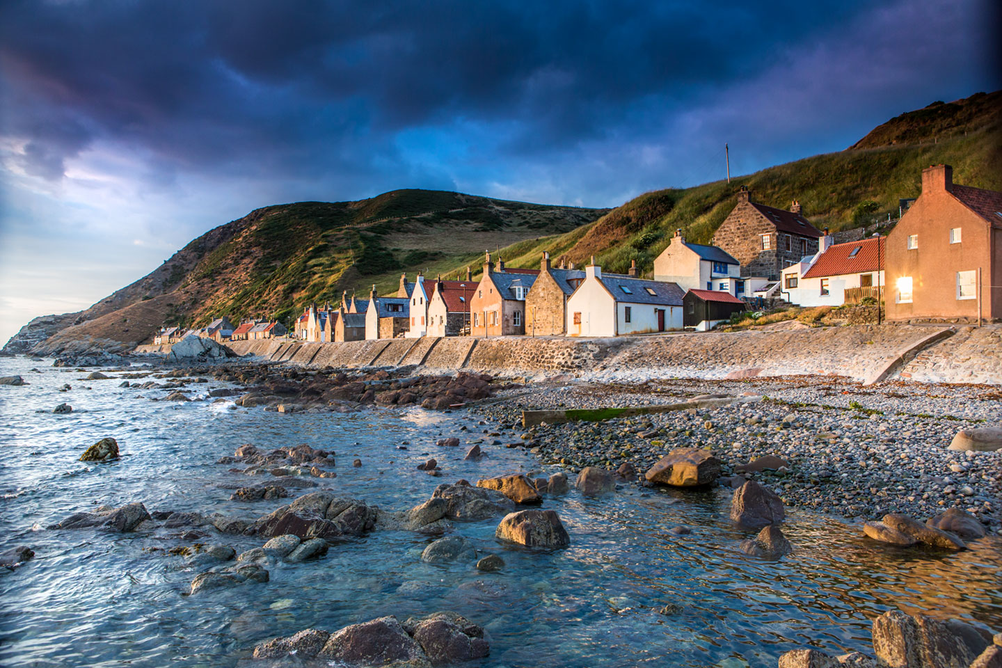 Little houses in the coastal town of Crovie in Scotland