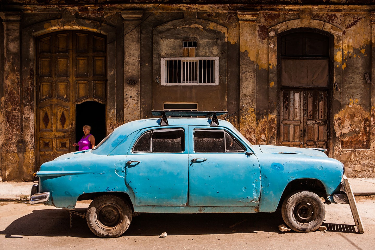Vintage car being repaired on the streets of Havana, Cuba