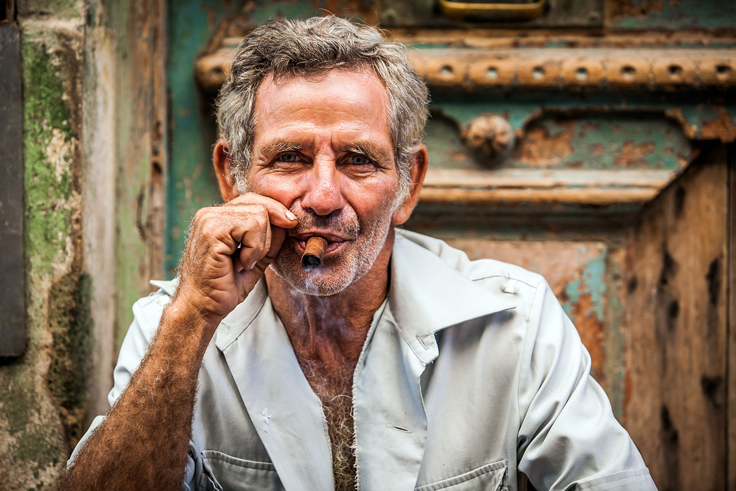 Man smoking a cuban cigar in Havana, Cuba