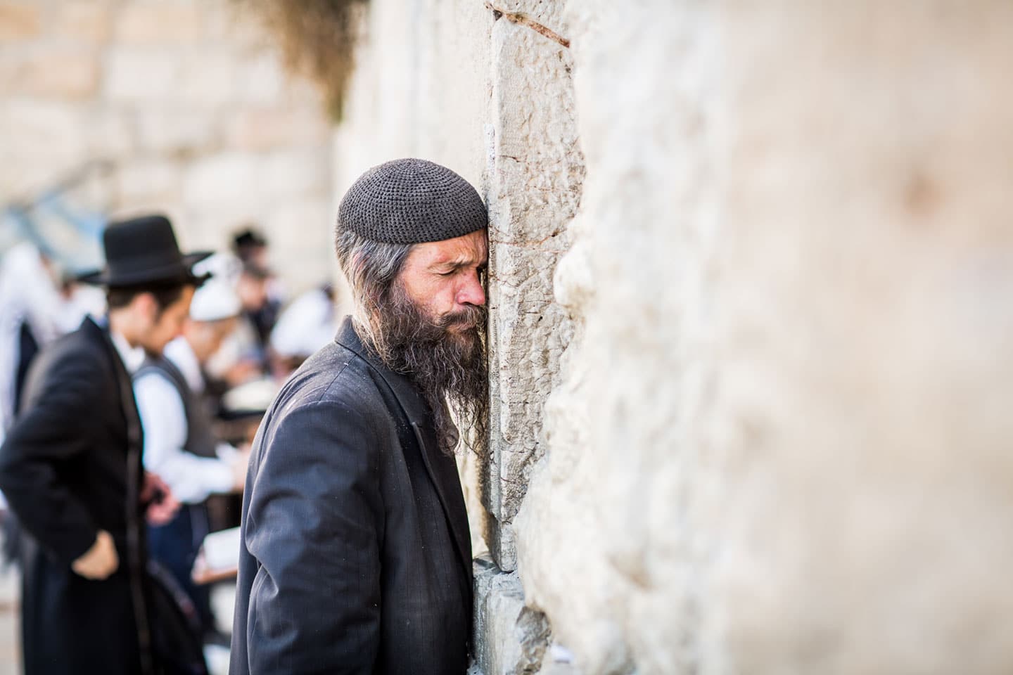 Man praying at the Western Wall of Jerusalem, Israel
