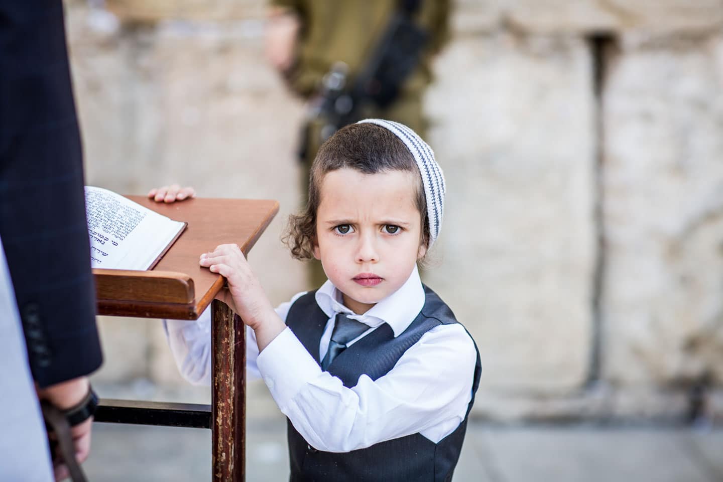 Young jewish boy at the Western Wall of Jerusalem, Israel