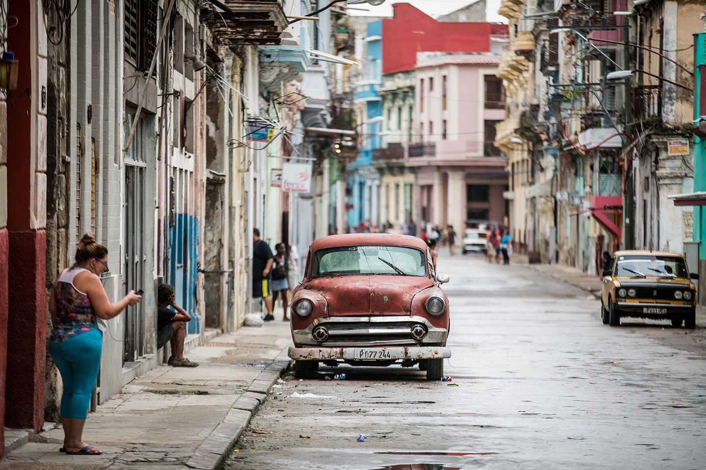 Typical street in Havana, Cuba with vintage old cars