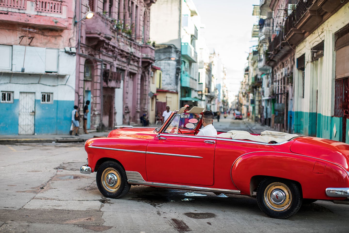 Vintage car driving around the streets of Havana, Cuba