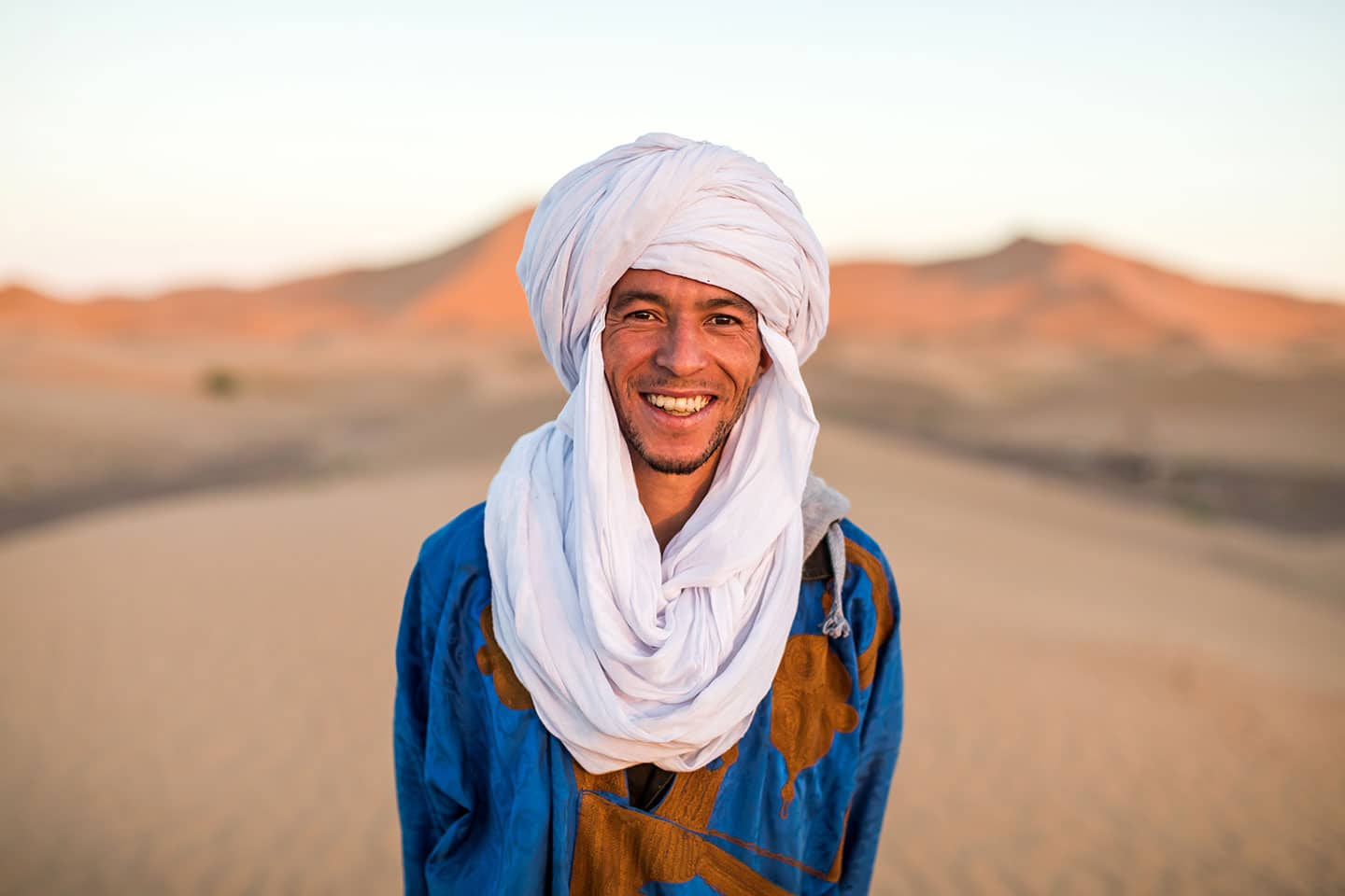 Nomadic bedouin guy in the Sahara desert of Morocco