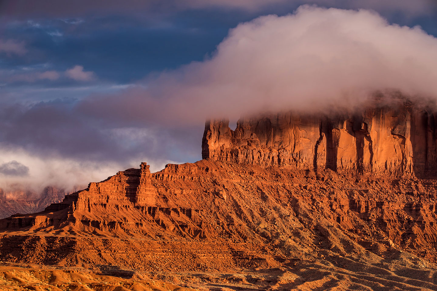 Cloud formation over a butte in Monument Valley National Park
