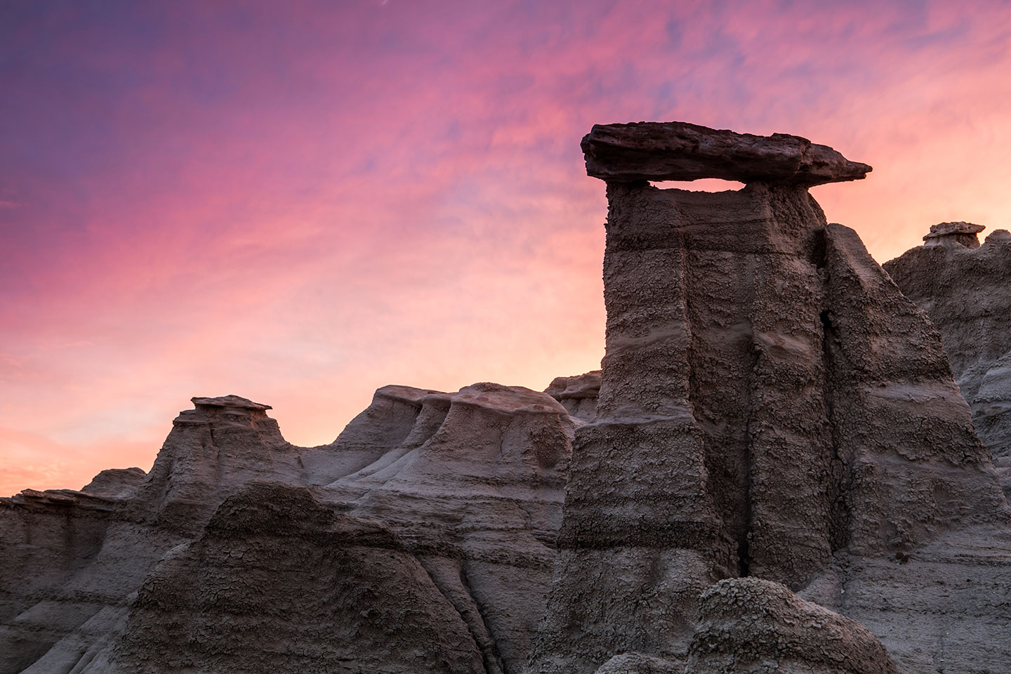 Hoodoo at sunset in the De-Na-Zin Wilderness of Bisti Badlands, New Mexico